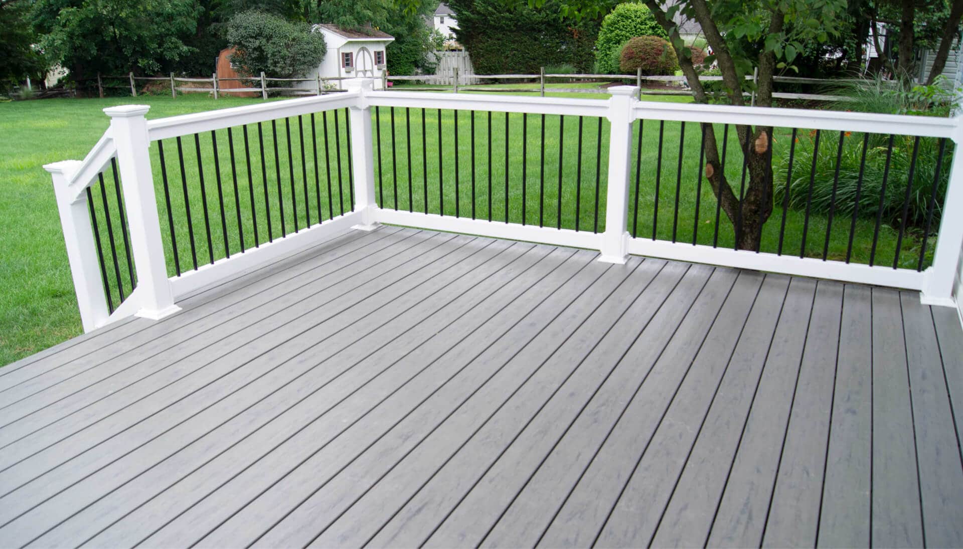 White railings and covers add style to a grey deck in a Richmond property.